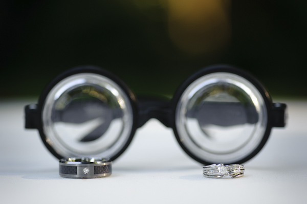 rings in front of glasses - wedding photo by top Portland, Oregon wedding photographer Aaron Courter
